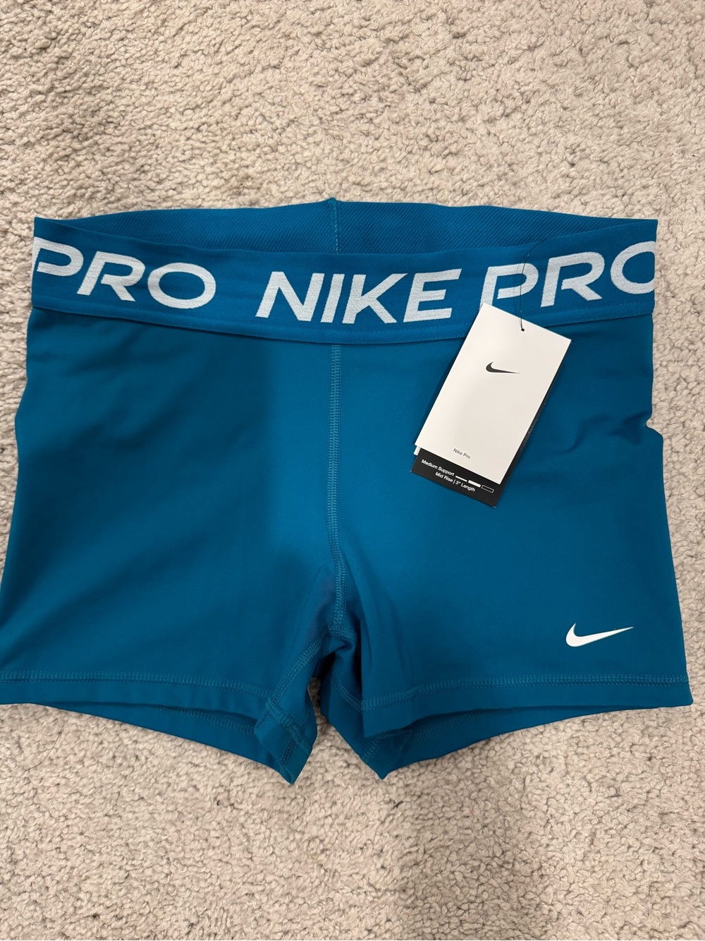 Nike Blue Pro Compression Shorts with White Swoosh